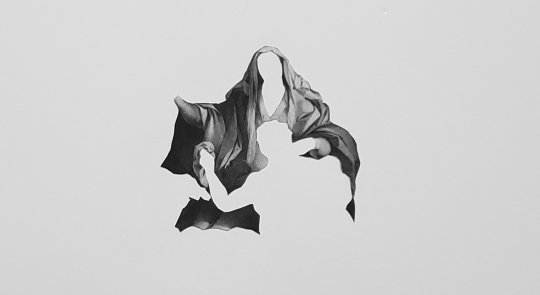 A greyscale image of a Virgin Mary figure in heavy robes without a face or hands, with a second figure visible against her shape by its negative space